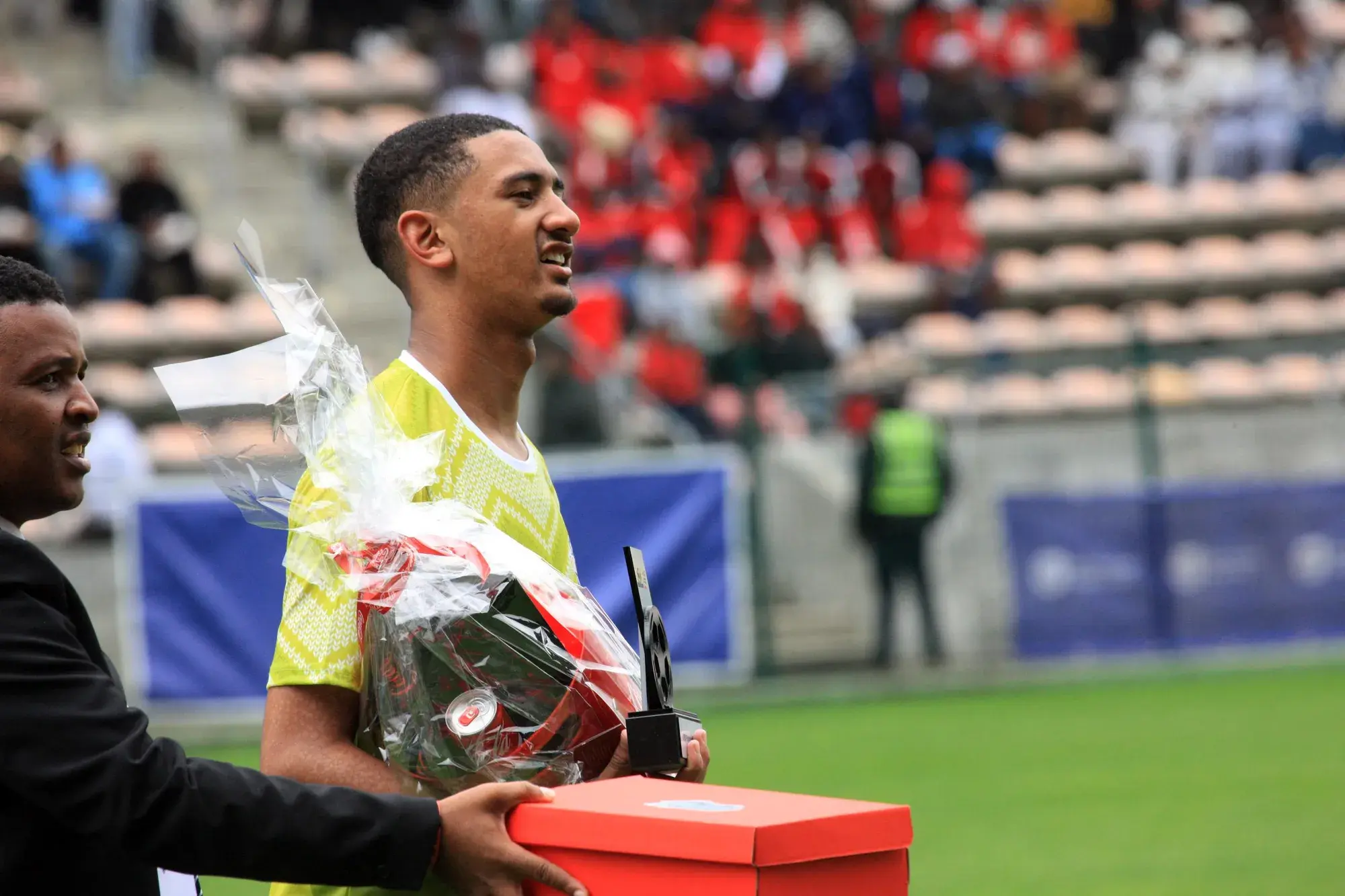 Rising Stars goalkeeper Alonso Juta poses for a picture after being named Player of the Series and Goalkeeper of the Series in the under-18 division of the Coke Cup at Athlone Stadium on Saturday.