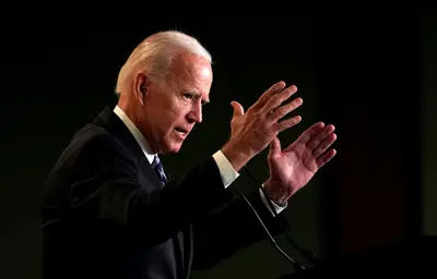 Biden bids to quell storm over campaign trail kiss