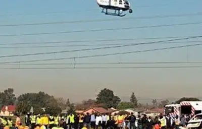 Nine children killed as train, minibus collide