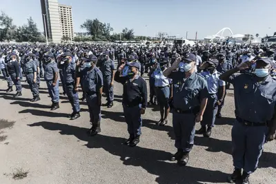 Police make community rescuers at Stilfontein sign indemnity forms ...